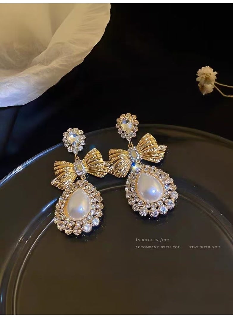 [شبكة كاملة الساخنة] bowknot اللؤلؤ الأقراط الإناث كبار الإحساس بالإنترنت الأقراط المشاهير 2025 ملحقات جديدة عيد ميلاد هدية - Image 1