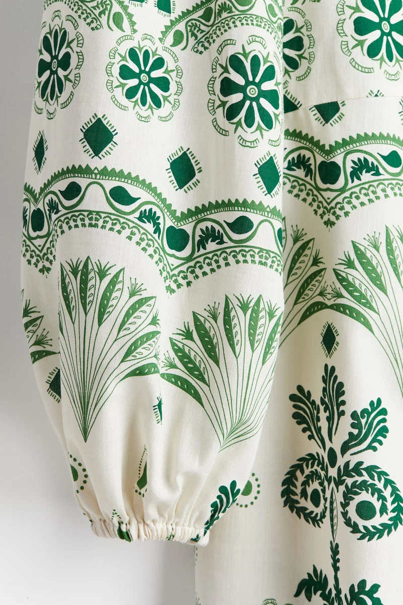 اتش اند ام فستان من القطن بتصميم ملفوف