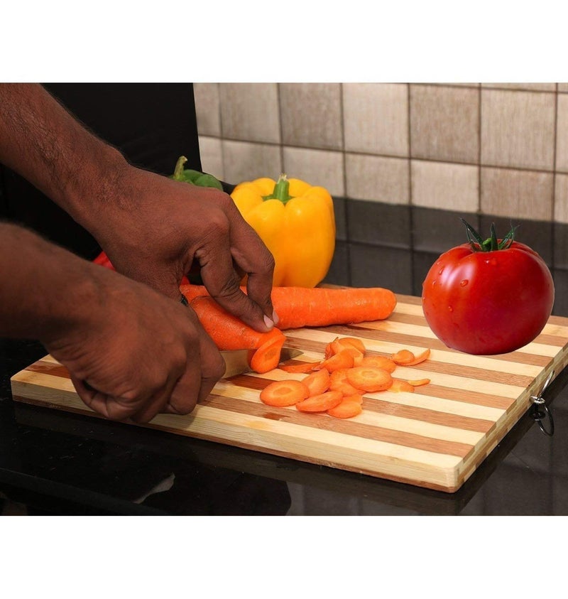 Go Hooked Go Hooked Wooden Bamboo Kitchen Chopping Cutting and Slicing Board with Holder for Fruits Vegetables and Meat Antibacterial Surface with Stainless Steel Handle Wooden Color Pack of 1 32x22 Cm  - Image 4