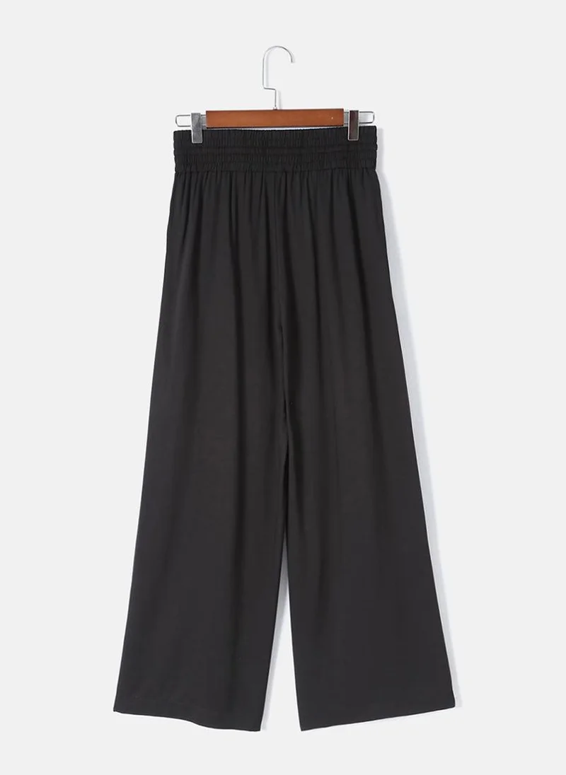 يونيكي Black Plain Casual Trouser