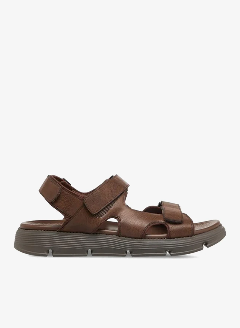 لو كونفورت صنادل رجالية بشريط لاصق