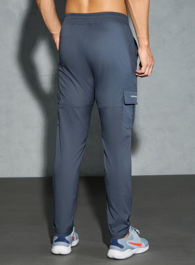 تكنوسبورت بنطلون كارجو رجالي تكنوسبورت بقصة مريحة بنقشة صلبة مع تقنية - Image 3