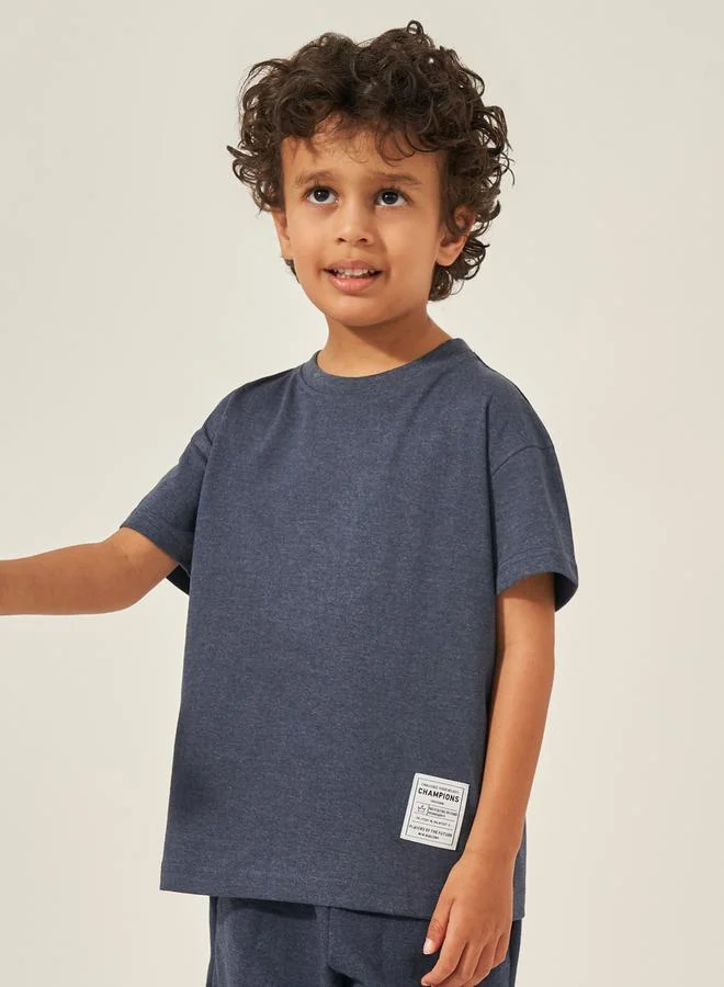 Styli Styli Solid Oversized T-Shirt with Badge Detail