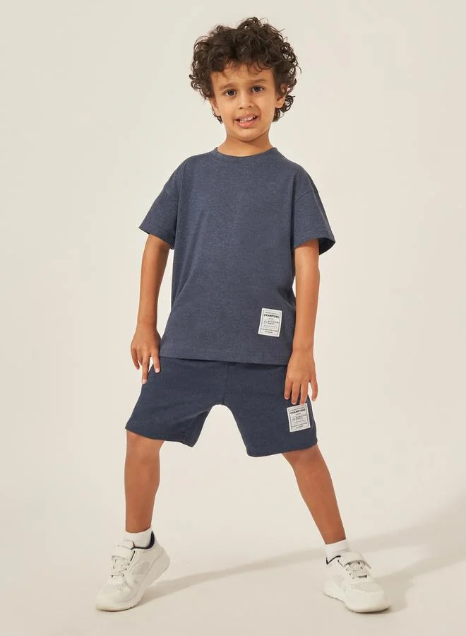 Styli Styli Solid Oversized T-Shirt with Badge Detail