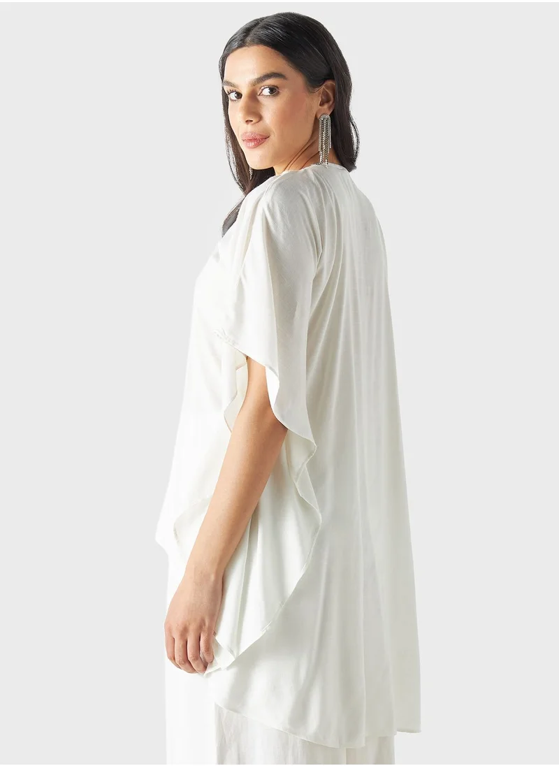 ايكونيك Embellished Cape Sleeve Top