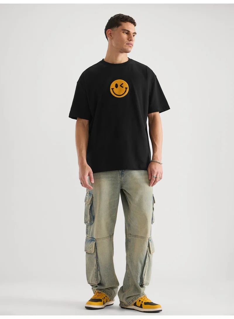 The Souled Store  The Souled Store Men S.W.SMILEY Embroidered Black Oversized T-Shirt for Men | Best Price UAE