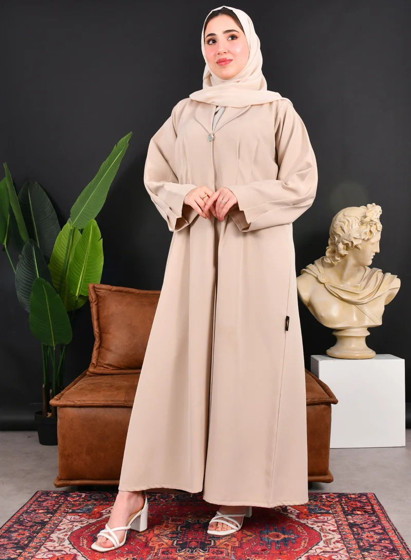 HAWRAA ABAYA Beige formal blazer abaya with pleats at the back and buttoned sleeves