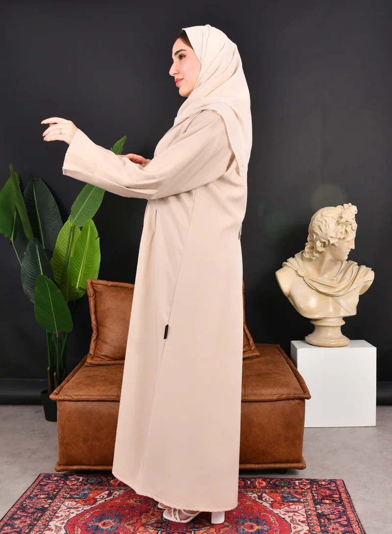 HAWRAA ABAYA Beige formal blazer abaya with pleats at the back and buttoned sleeves