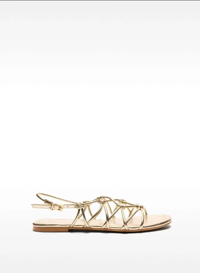Flat Sandals With Crossed Straps And Knots