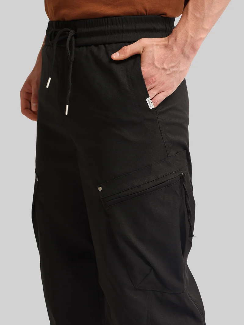 مانياك Maniac Mens Solid Pattern Black Canvas fabric Baggy Trackpant