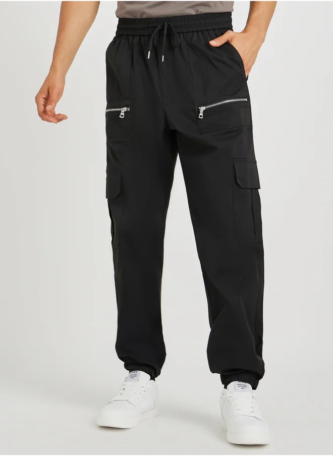 ستايلي Styli Men Olive Solid Relaxed Fit Cargo Joggers with Zipper Detail