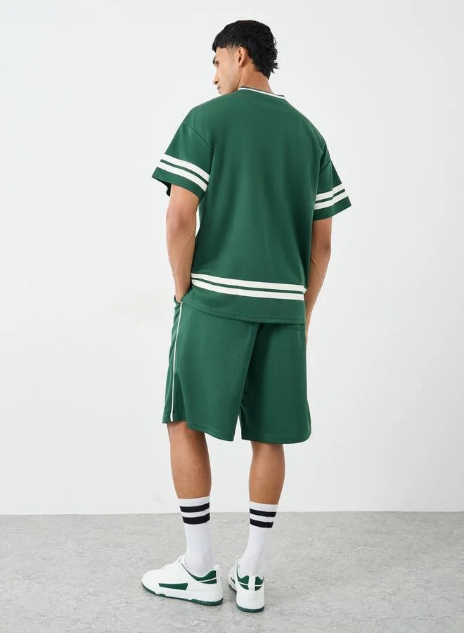 Styli Styli Men Green V Neck Printed Boxy T-Shirt and Oversized Shorts Co-Ords