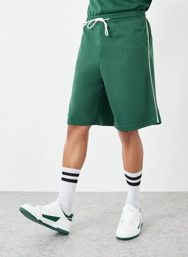 Styli Styli Men Green V Neck Printed Boxy T-Shirt and Oversized Shorts Co-Ords