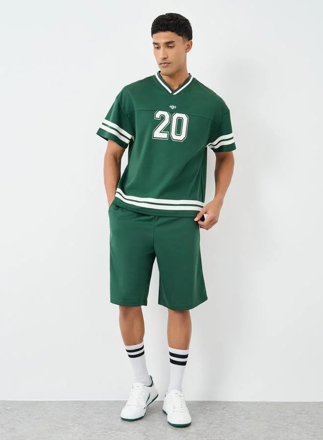 Styli Styli Men Green V Neck Printed Boxy T-Shirt and Oversized Shorts Co-Ords
