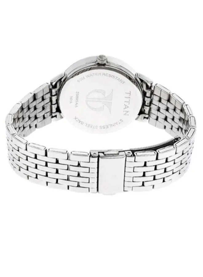 تيتان Women Analog Round Shape Stainless Steel Wrist Watch - 2569SM01