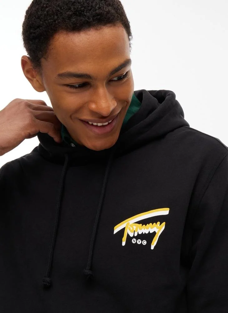 Tommy Jeans  Signature Back Graphic Sueded Terry Hoody for Men | Best Price UAE