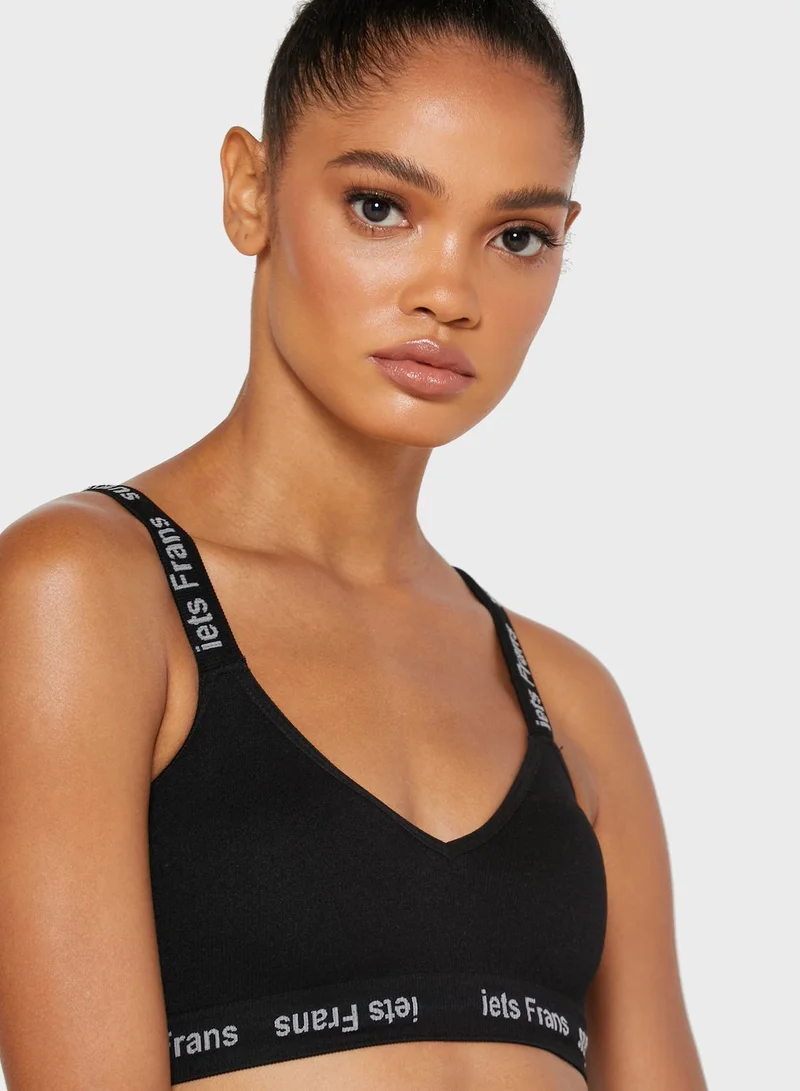 URBAN OUTFITTERS Slogan Band Sports Bra