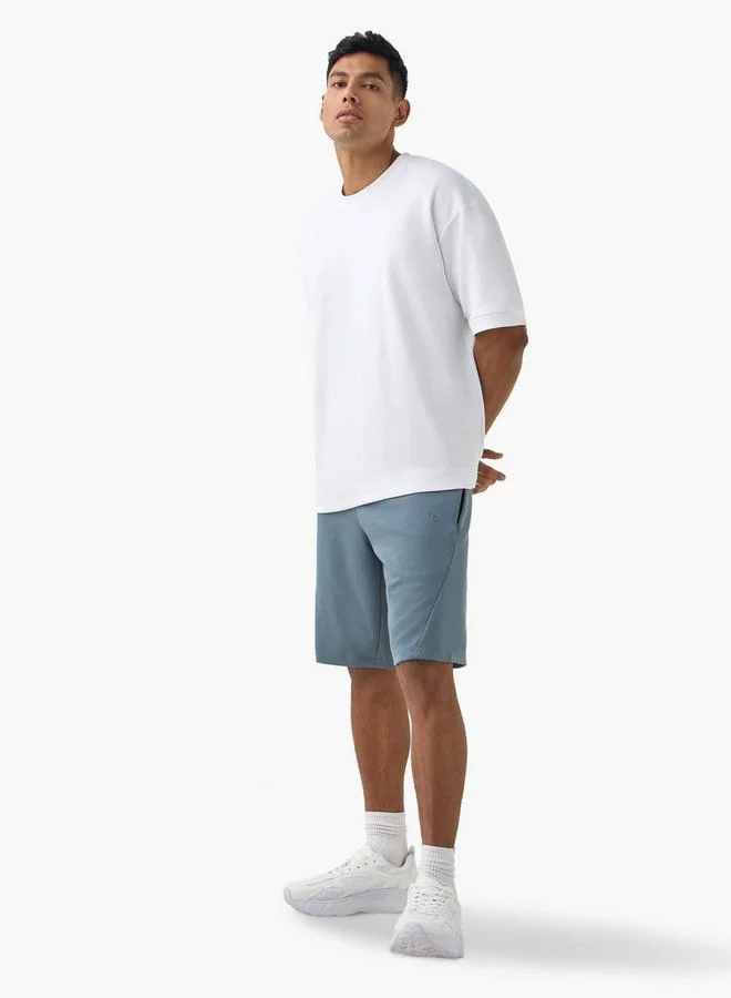 ادوت من سبلاش شورت أداء بجيوب ورباط