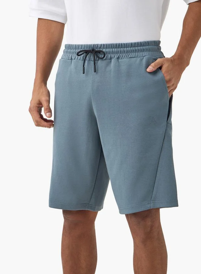 ادوت من سبلاش شورت أداء بجيوب ورباط