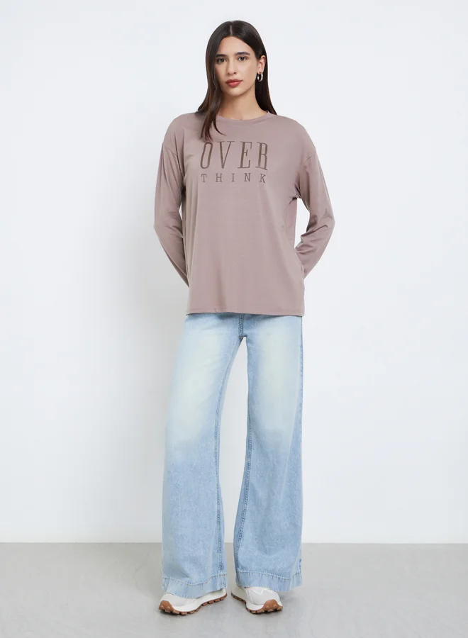 ستايلي تيشيرت واسع مطبع بكتابة