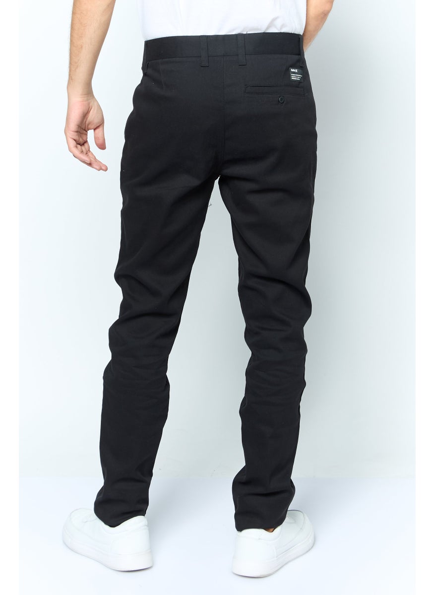 Men Slim Fit Brand Logo Chino Pants, Black - pzsku/ZC0B59EBA285C1ABC5DBCZ/45/_/1737643080/472d0860-b413-4600-8988-2967b00c8414