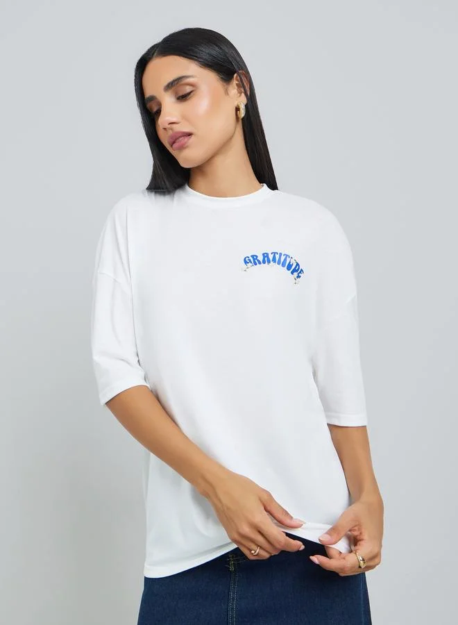Styli White Floral Graditude Front and Back Graphic Oversized T-Shirt