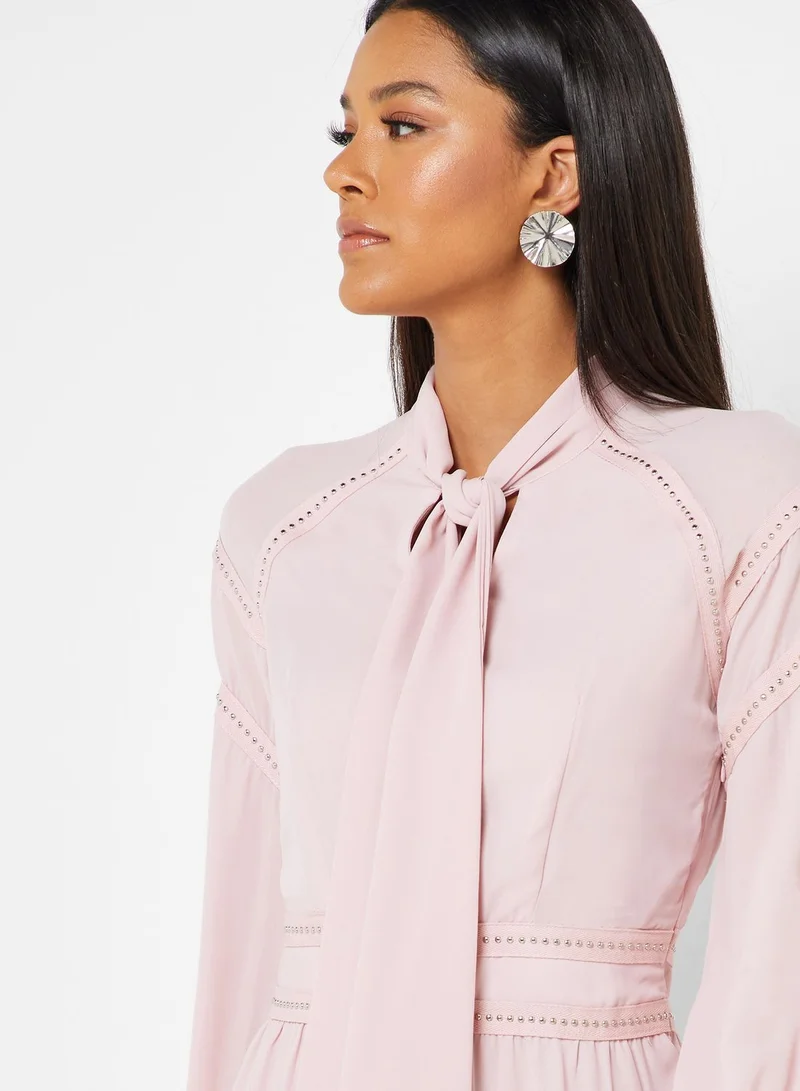 Iconic Tie Neck Pleated Hem Dress