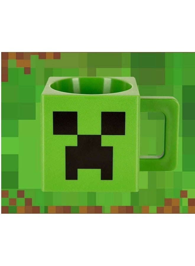 general The Minecraft Mug Is A Gaming Merchandise Product Adorned With Patterns And Models From The Minecraft Game. This Mug Is Suitable For Children And Can Be Used As A Drinking Cup. - Image 1