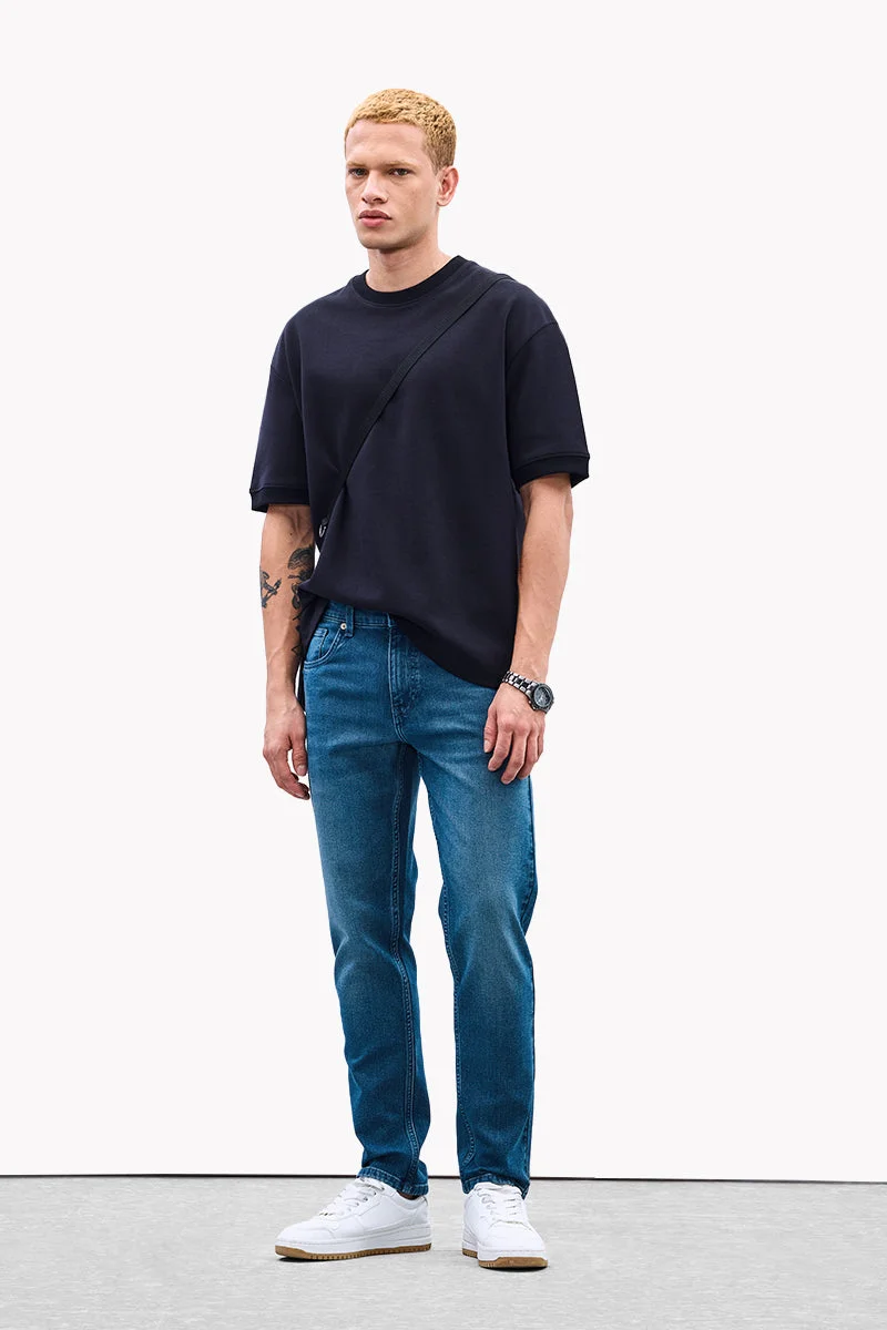 SNITCH جينز كور لاب بقصة ضيقة مطاطية مغسولة