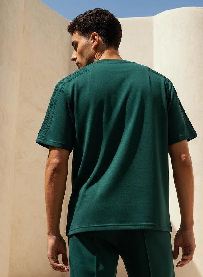 Kappa GREEN Kappa Men 2 Way Stretch Pique T shirt for Men | Best Price UAE