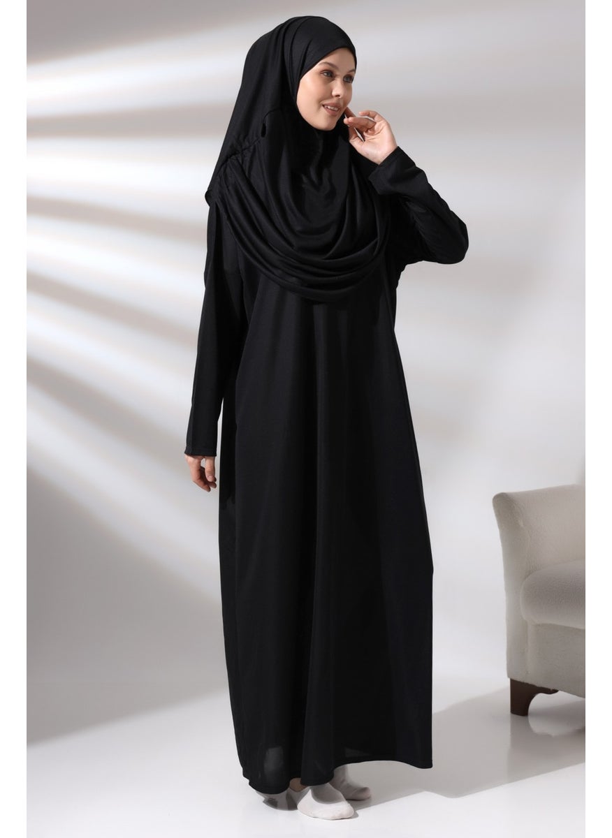 İhvan - ثوب صلاة عملي مكون من قطعة واحدة للنساء من احواش باللون الأسود مع حقيبة - Image 1