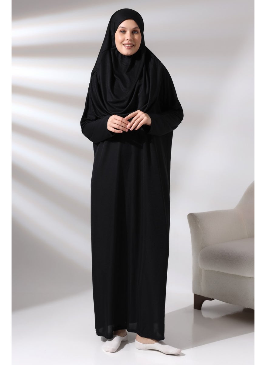 İhvan - ثوب صلاة عملي مكون من قطعة واحدة للنساء من احواش باللون الأسود مع حقيبة - Image 1