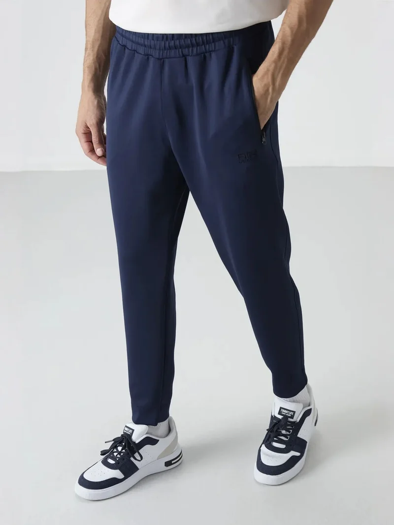 تومي لايف TOMMY Men's Solid Jogger Sweatpants