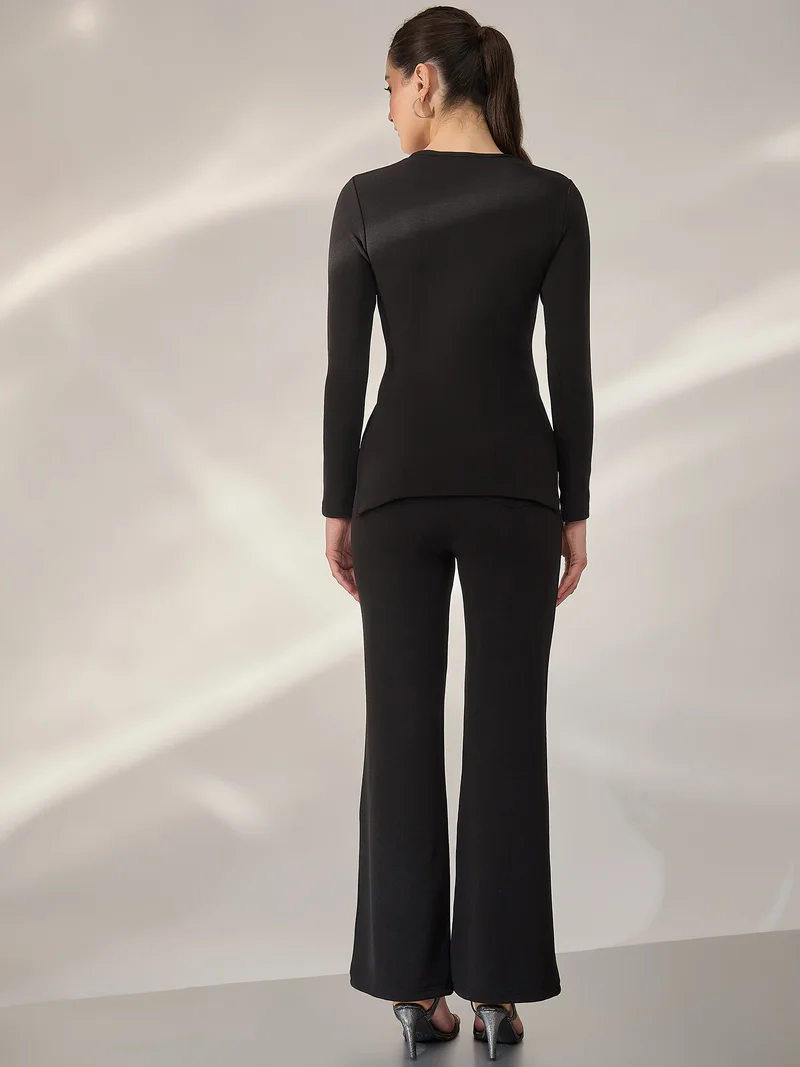 بانيت طقم نسائي أسود مخطط مع بنطلون