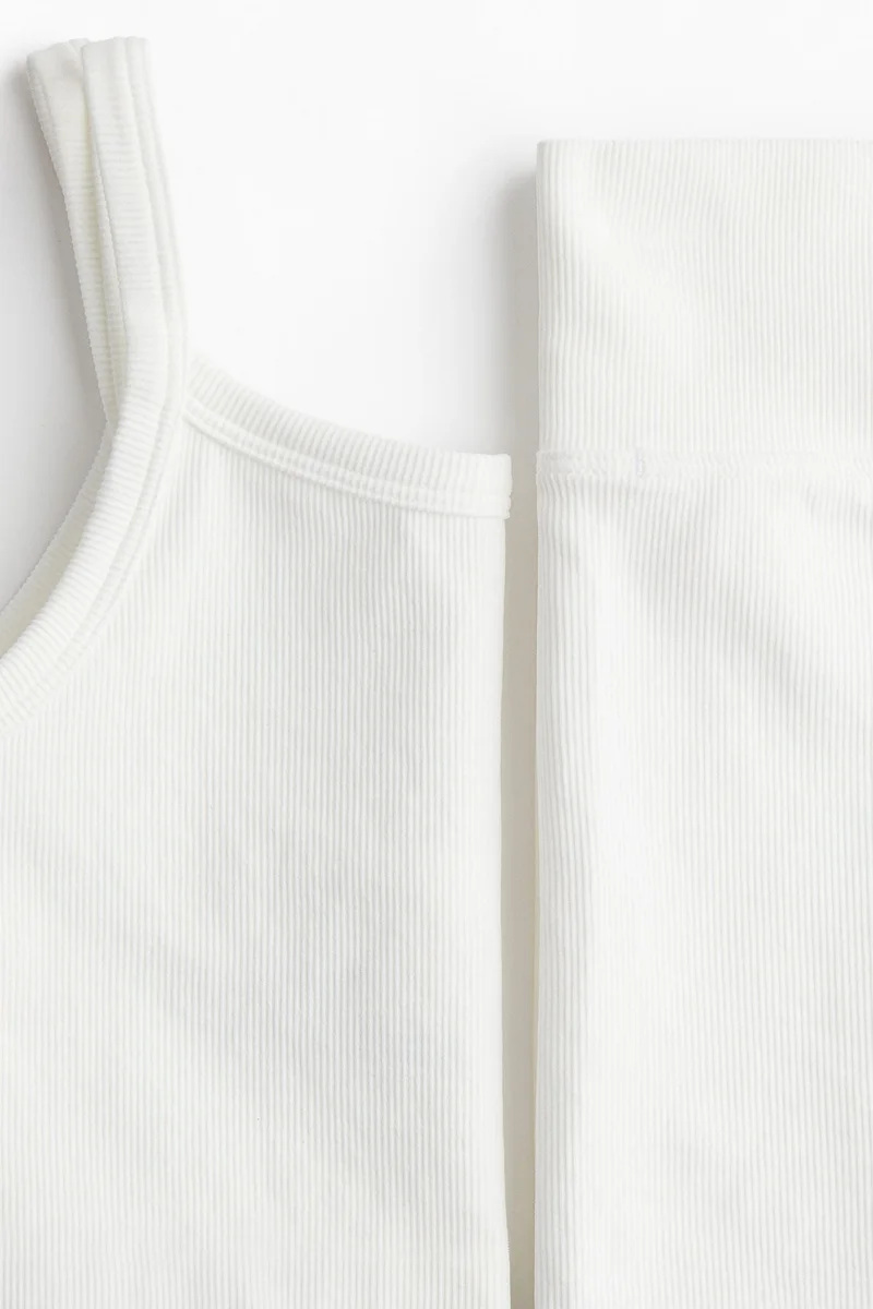 اتش اند ام طقم رياضي بدون درزات من نسيج دراي موف - قطعتين