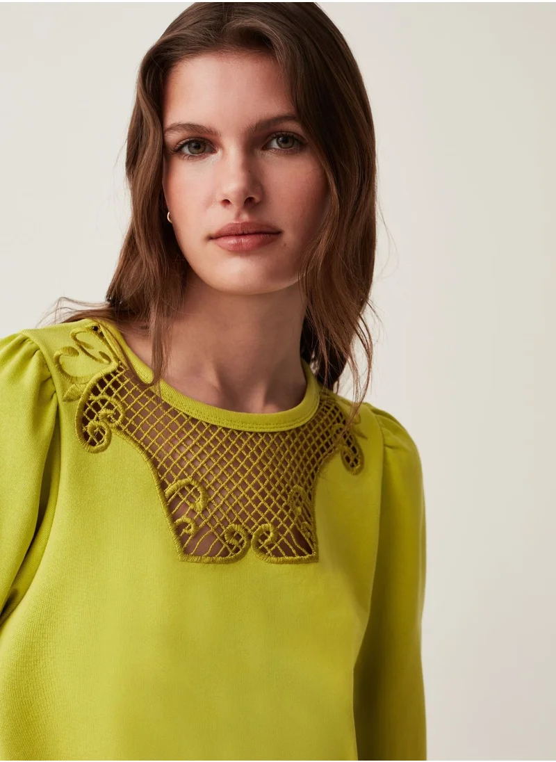 او في اس Round-neck sweatshirt with crochet insert