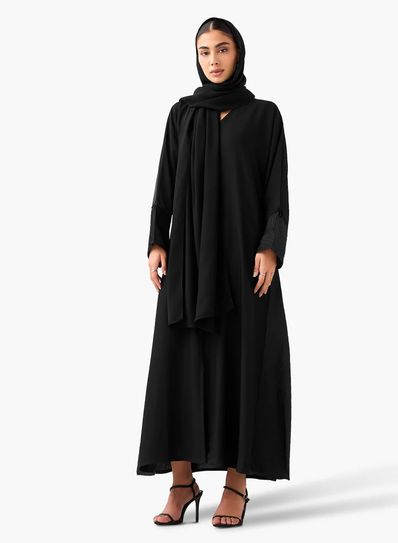 هدية المدينة  عباية سوداء عصرية