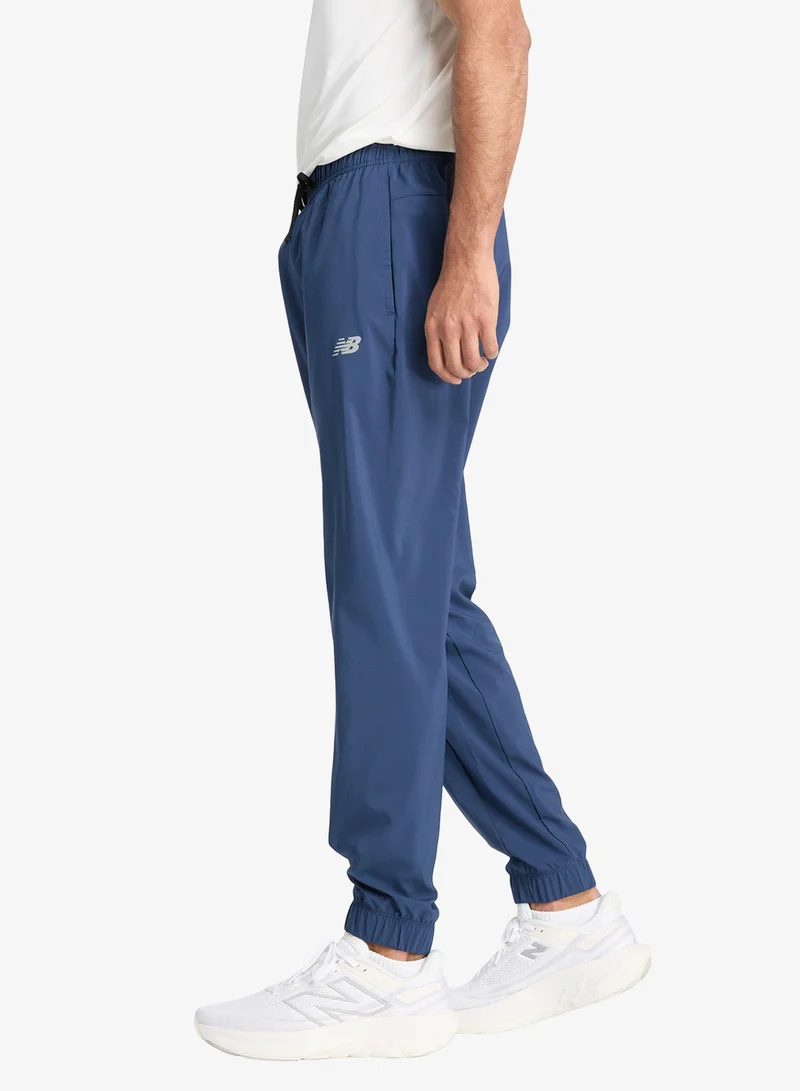 New Balance navy Essentials Woven Sweatpants for Men | Best Price UAE