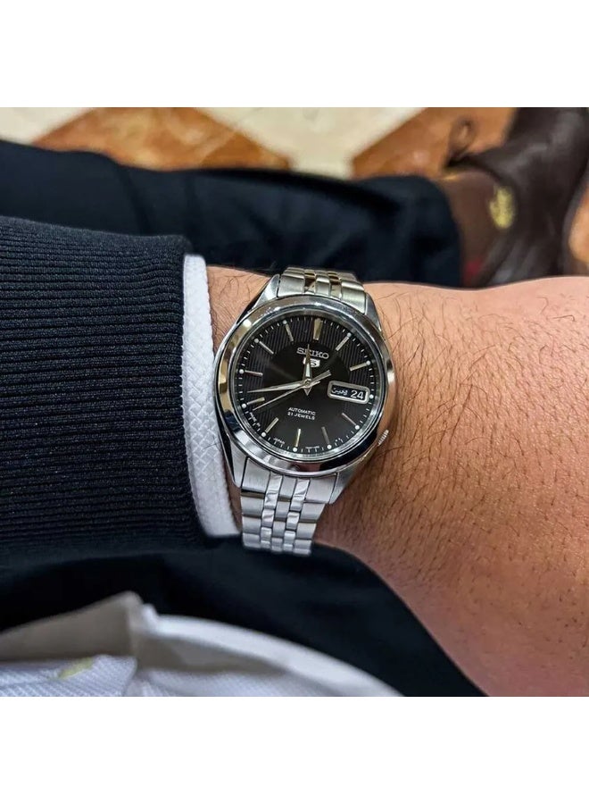 Seiko سايكو 5 أوتوماتيكي ساعة يد للرجال SNKL23J1 - صنع في اليابان، قرص توكسيدو أسود، علبة من الفولاذ المقاوم للصدأ 38 مم، 21 جوهرة إصدار JDM - Image 1