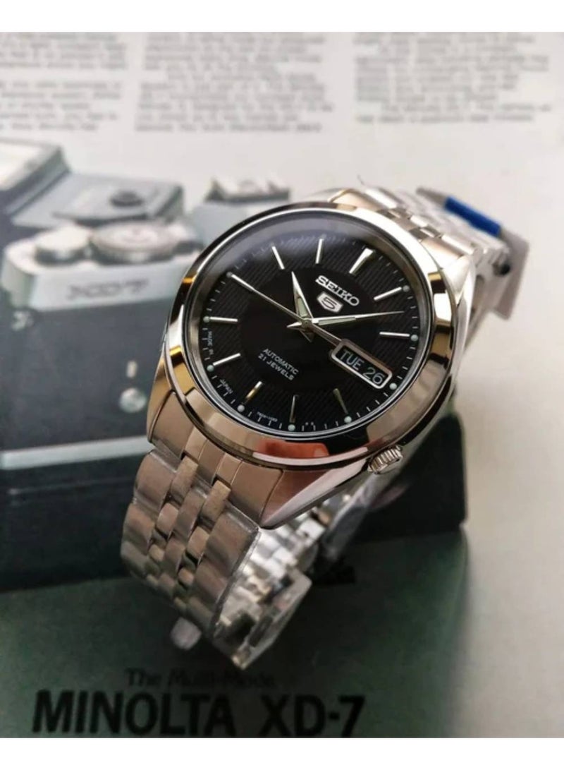 Seiko سايكو 5 أوتوماتيكي ساعة يد للرجال SNKL23J1 - صنع في اليابان، قرص توكسيدو أسود، علبة من الفولاذ المقاوم للصدأ 38 مم، 21 جوهرة إصدار JDM - Image 5