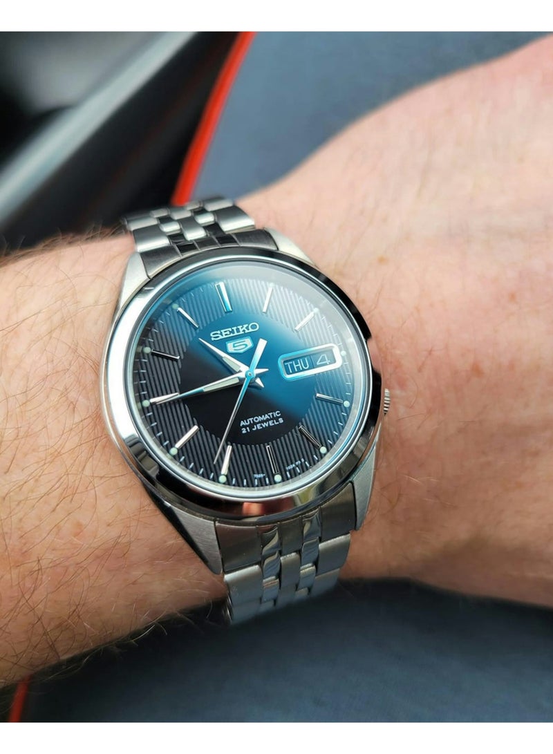 Seiko سايكو 5 أوتوماتيكي ساعة يد للرجال SNKL23J1 - صنع في اليابان، قرص توكسيدو أسود، علبة من الفولاذ المقاوم للصدأ 38 مم، 21 جوهرة إصدار JDM - Image 4