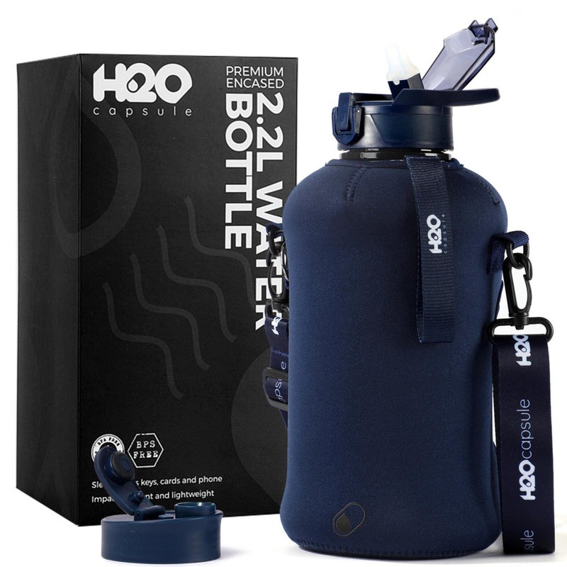 H2O Capsule 2.2L Half Gallon Water Bottle with Storage Sleeve and Covered Straw Lid - BPA Free Large Reusable Drink Container with Handle - Big Sports Jug  2.2 Liter (74 Ounce) Navy Blue - Image 1