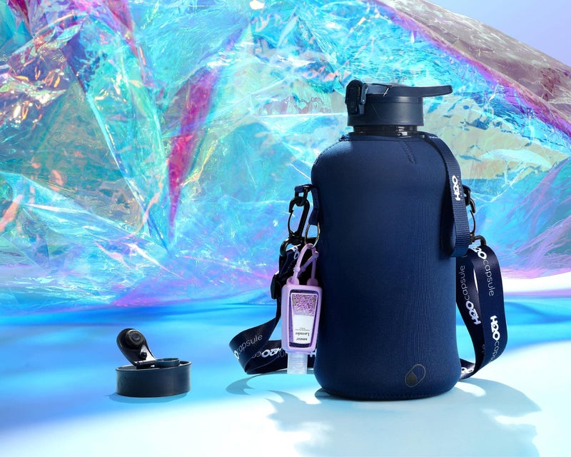H2O Capsule 2.2L Half Gallon Water Bottle with Storage Sleeve and Covered Straw Lid - BPA Free Large Reusable Drink Container with Handle - Big Sports Jug  2.2 Liter (74 Ounce) Navy Blue - Image 4