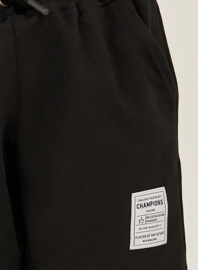 Styli Badge Detail Drawstring Waist Shorts with Side and Back Pockets