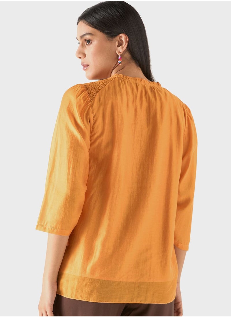 Iconic - Ruched Flared Sleeve Top - Image 1