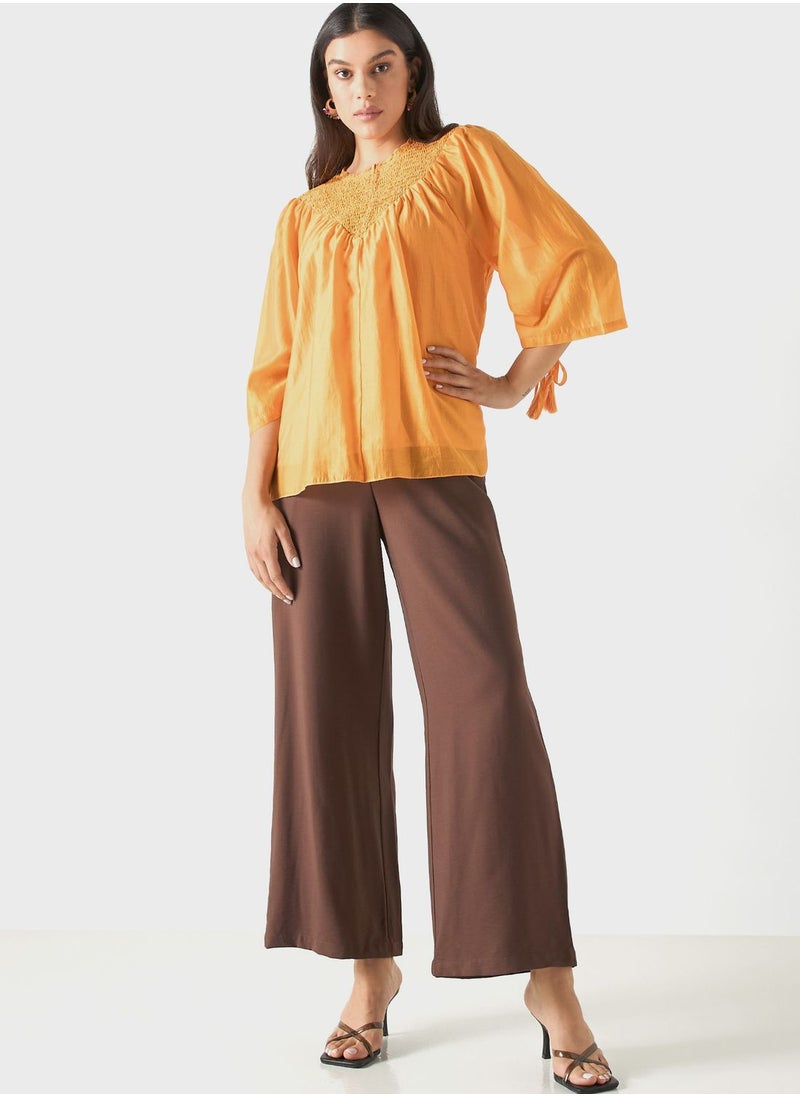 Iconic - Ruched Flared Sleeve Top - Image 1