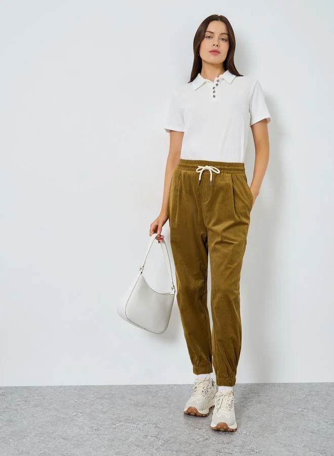 ستايلي تيشيرت بولو مضلع بأكمام قصيرة