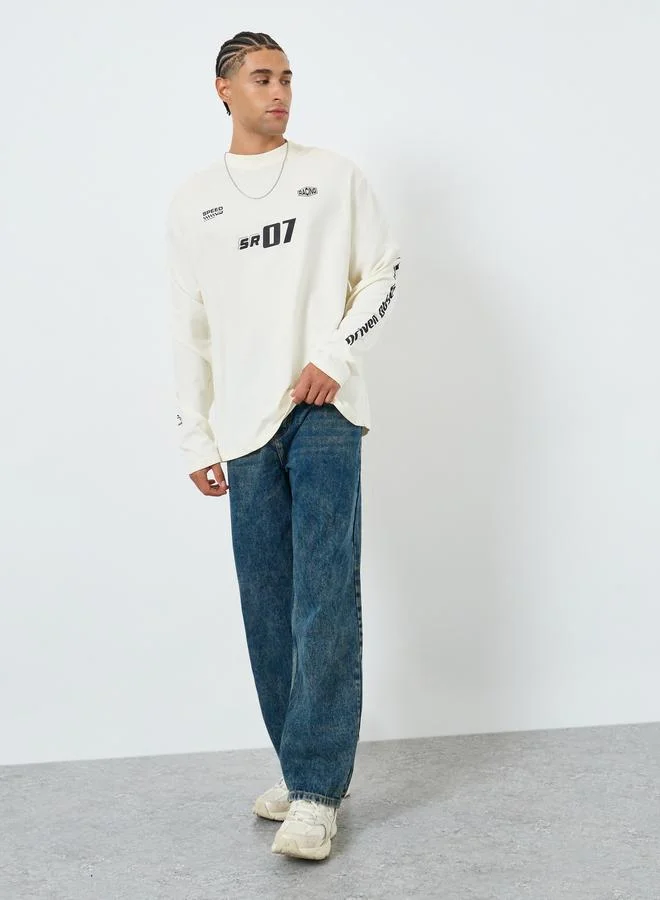 Styli Men Cream Graphic Print Oversized T-Shirt