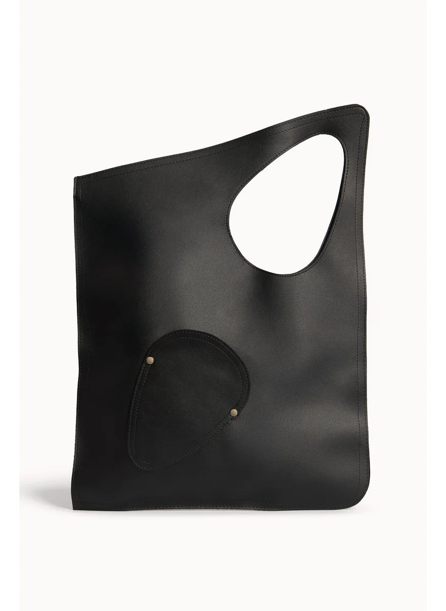 Wecre8 Black Asymmetrical Tote Bag by WECRE8