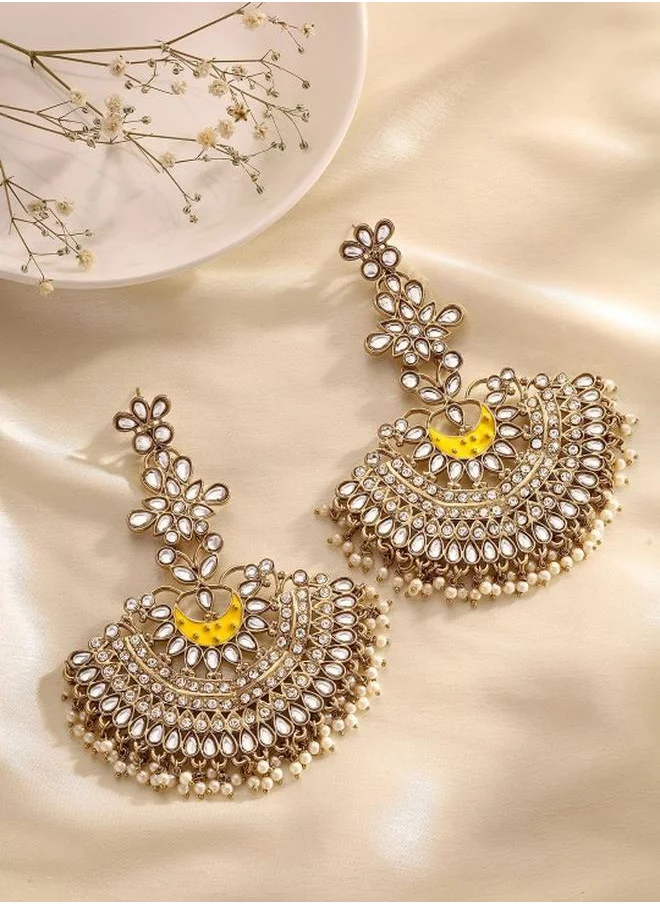 Priyaasi Ethnic Women Yellow Brass Earrings with pattern and secured with Post and Back closure and styled in ideal for Ethnic moments — designed to make heads turn.